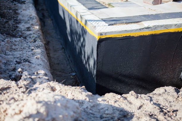Professional Waterproofing technician working in Gainesville, NY